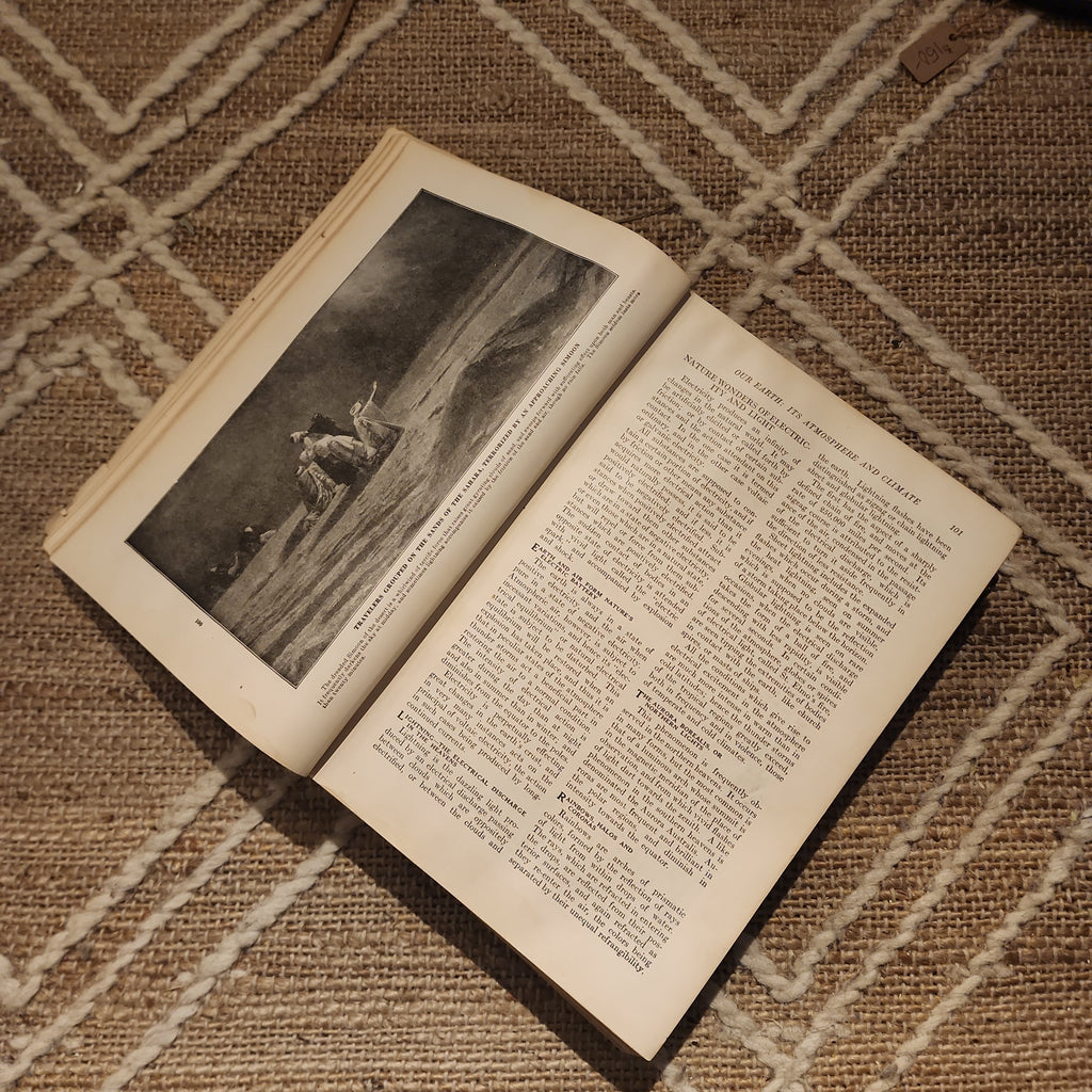 Vintage hardcover book open to aged illustrated spread | The Olde 1840