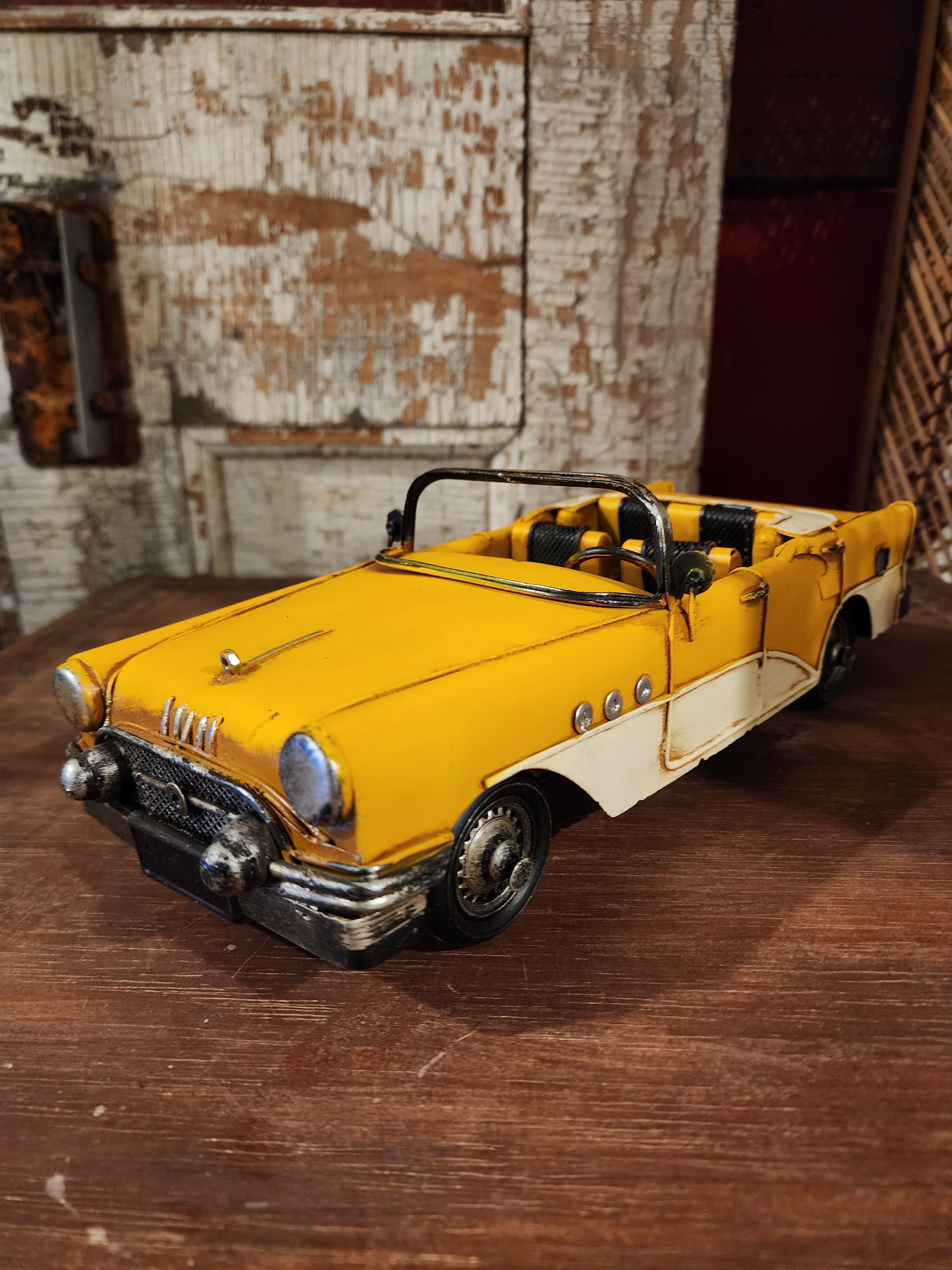 Retro metal vintage automobile figurine in tin-car style