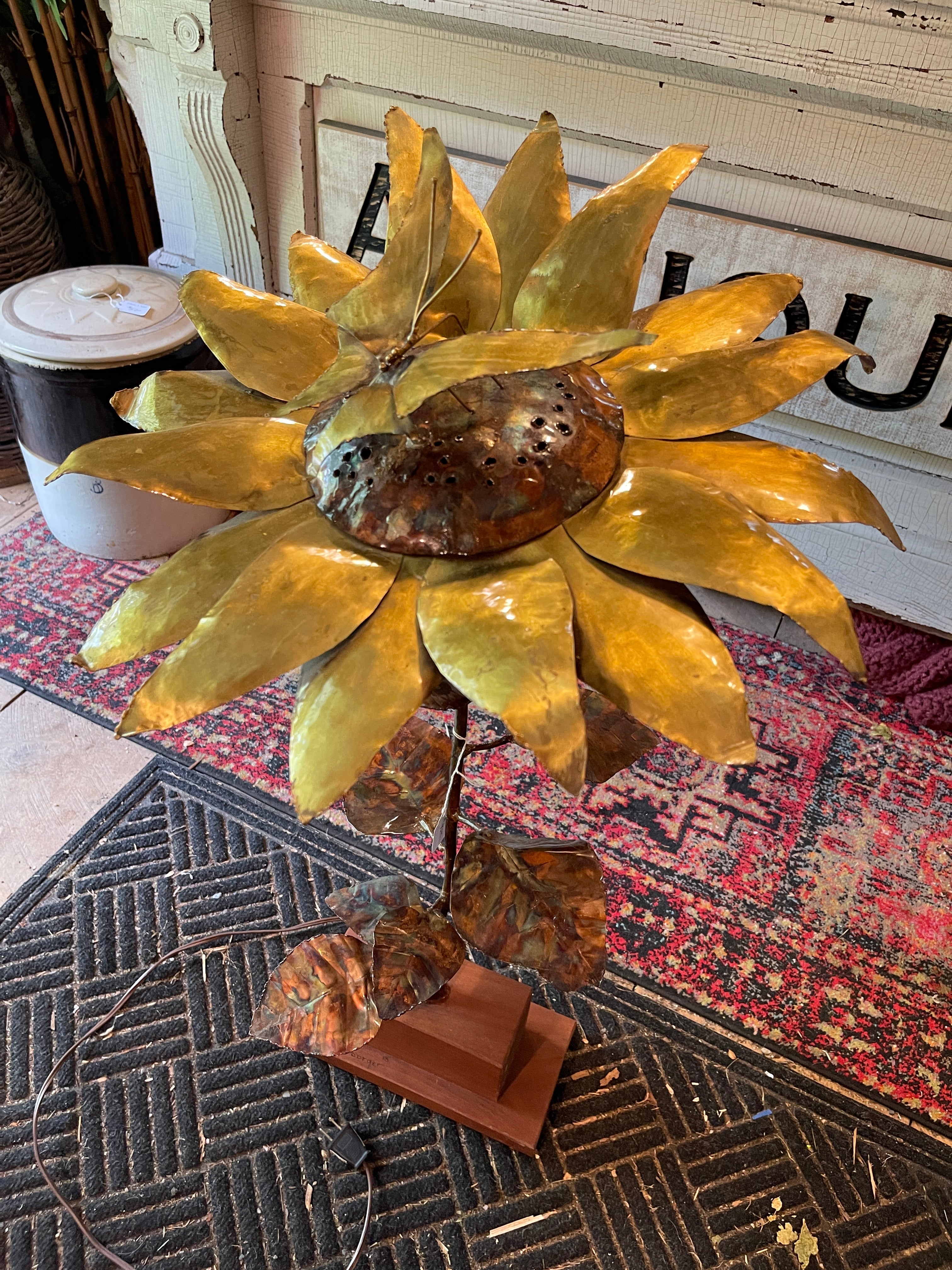 Handcrafted brass and copper sunflower accent light on wooden base