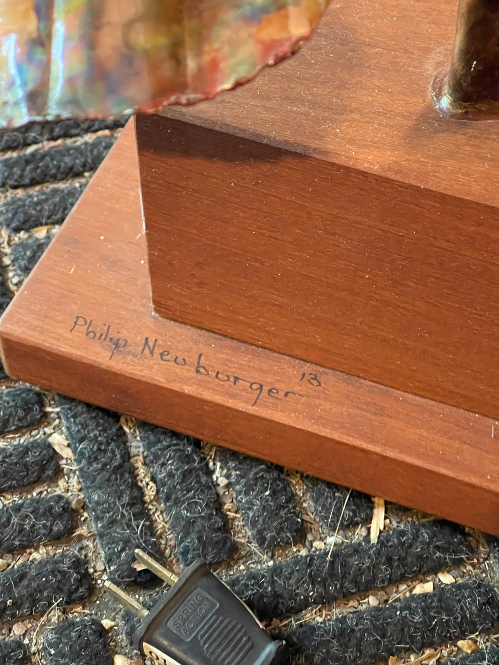 Handcrafted brass and copper sunflower accent light on wooden base